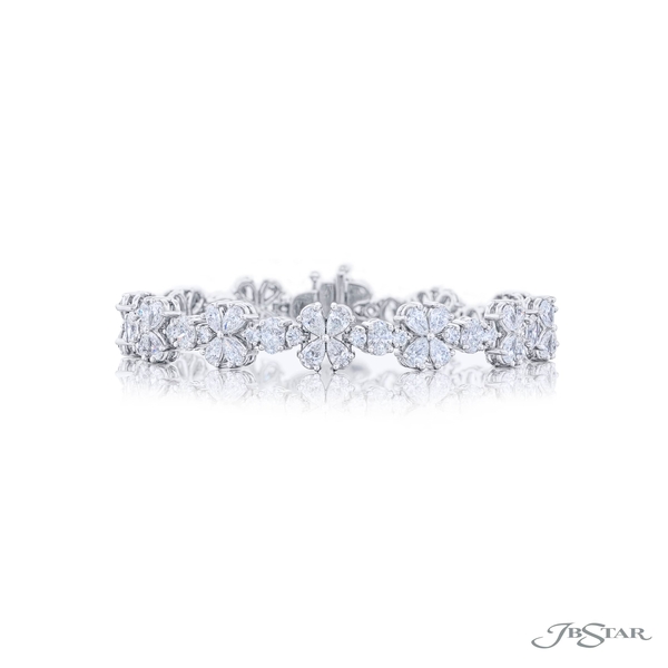 Flower shaped diamond bracelet featuring pear-shape oval and round diamonds in a beautiful floral-like design. 3675-007