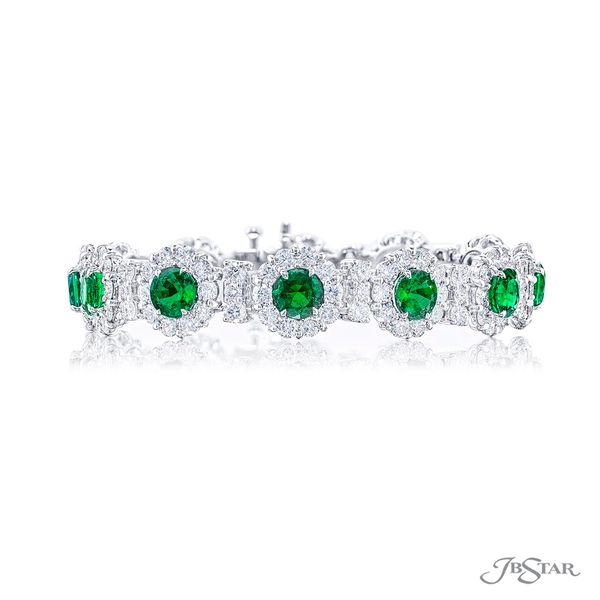 Emerald and diamond bracelet featuring round emeralds surrounded by micro pave and linked together by a row of diamonds. 2577-011