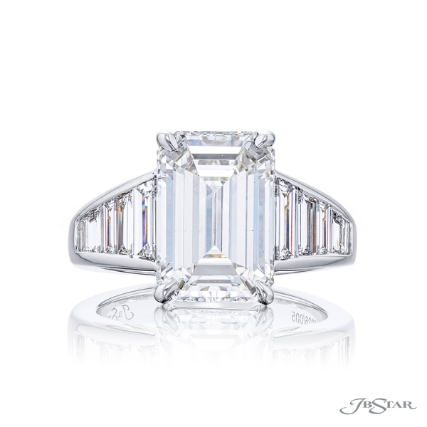 5.07 ct. GIA certified emerald-cut diamond center set between trapezoid diamonds in a channel setting. 5926-005