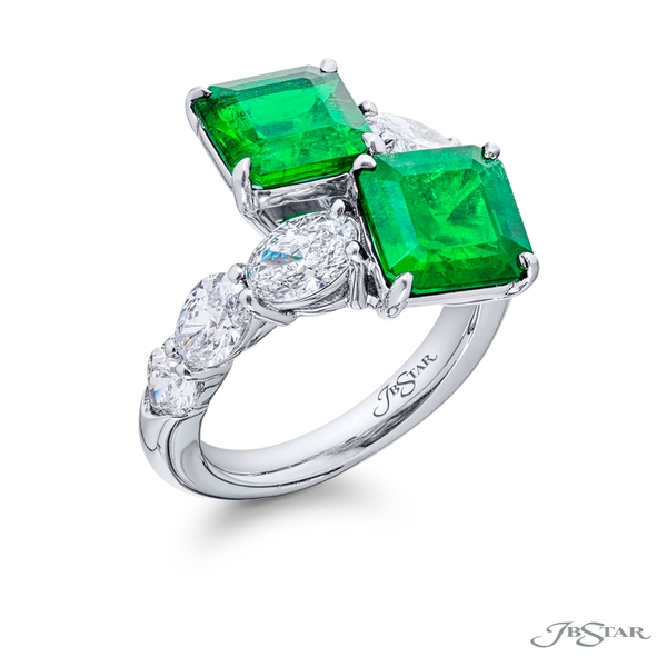 Two stone ring featuring 2 CDC certified Colombian emeralds embraced by east to west oval diamonds. 5597-010v2