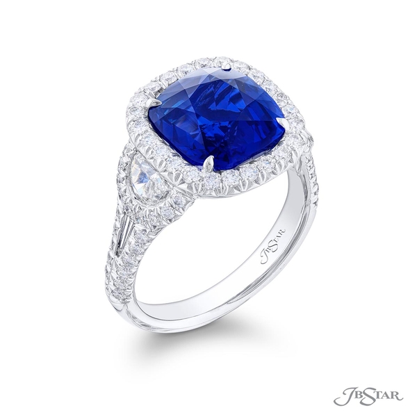 Sapphire and diamond ring featuring a 5.64 ct. GIA certified no-heat cushion cut sapphire center embraced by half moon and tapered baguette diamonds in a micro pave setting.1366-050v2