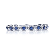 oval sapphire and round halo diamond bracelet.jpg