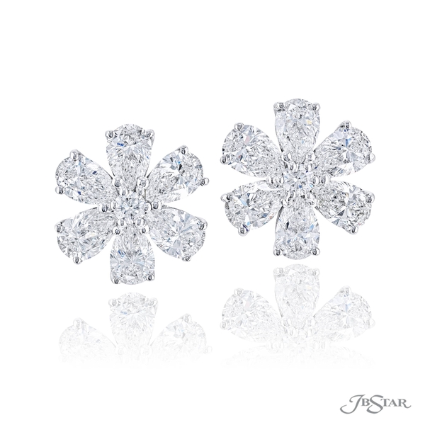 Diamond stud earrings featuring pear shape and round diamonds in a beautiful floral design.5792-001