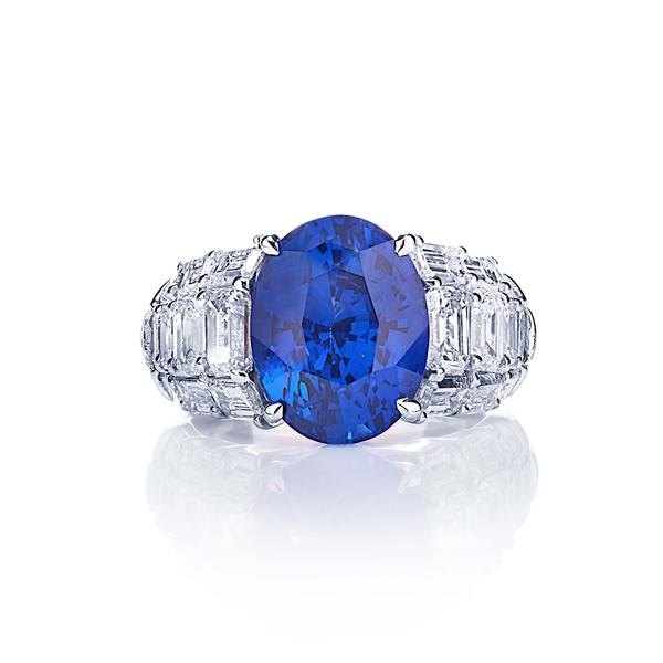8.01 oval blue sapphire GIA with three diamond rows.jpg