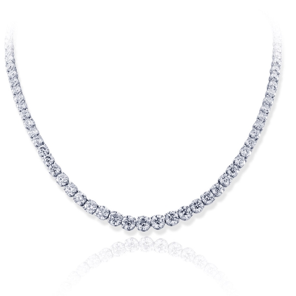 diamond necklace featuring a round GIA certified center accompanied by additional brilliant round diamonds in a shared prong setting.jpg