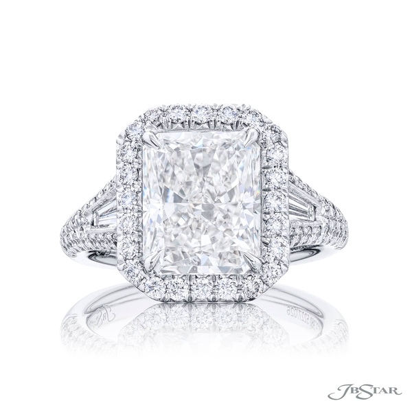 4.53 ct. GIA certified radiant-cut diamond center embraced by tapered baguette in a micro pave setting. 5227-026
