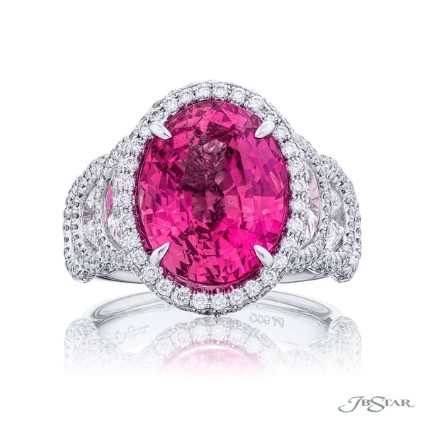 Pink sapphire and diamond ring featuring a spectacular 11.06 ct. certified Madagascar no-heat pink oval sapphire accompanied by half-moon diamonds in a micro pave setting.2129-017