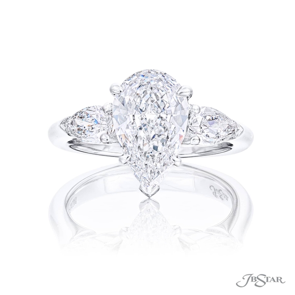 2.19 ct. GIA certified pear-shaped diamond center embraced by two additional pear shaped diamonds. 7264-030