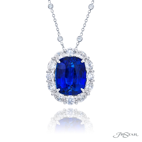 Sapphire and diamond pendant featuring a 6.08 ct. certified cushion cut sapphire embraced by perfectly matched round diamonds.1617-001