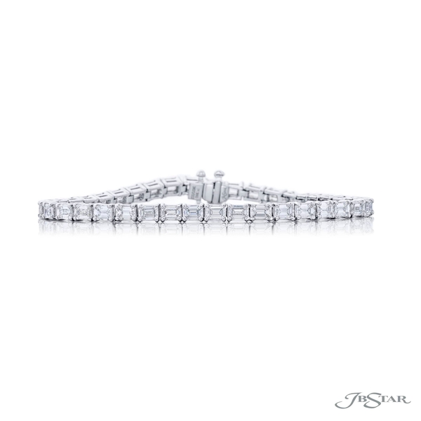 Diamond bracelet featuring 39 perfectly matched emerald-cut diamonds in a shared prong setting. 3620-002