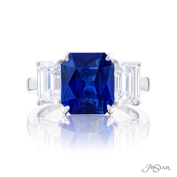 Sapphire and diamond ring featuring a 4.61 certified emerald-cut sapphire embraced between two emerald-cut diamonds.4783-090
