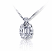 1.39 ct. GIA certified emerald cut diamond encircled by round diamonds and hung by an oval diamond.jpg