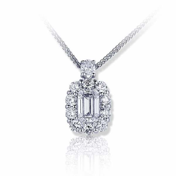 1.39 ct. GIA certified emerald cut diamond encircled by round diamonds and hung by an oval diamond.jpg
