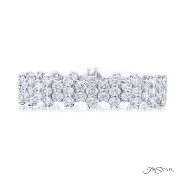Diamond bracelet featuring 3 rows of oval cushion-cut diamonds in a shared prong setting. 5919-001