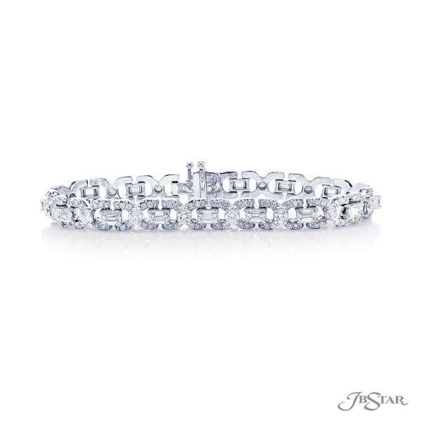 Diamond bracelet featuring emerald-cut diamonds linked together by round diamonds and pave.1702-001
