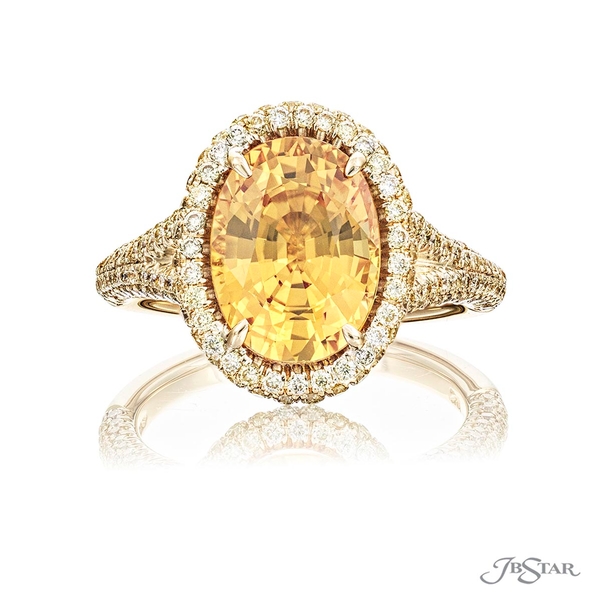 Yellow sapphire and diamond ring featuring a 4.42 ct. certified Sri Lankan yellow oval sapphire in a yellow diamond pave setting. Handcrafted in 18KY Gold. 0974-277
