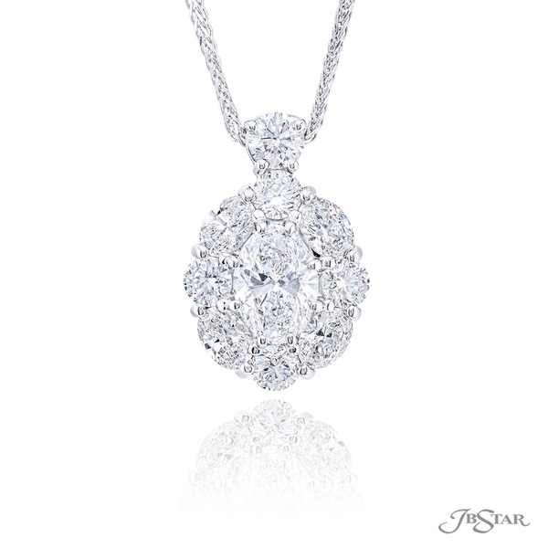 Diamond pendant featuring a 1.20 ct. certified oval diamond center encircled by round and oval diamonds.2366-013