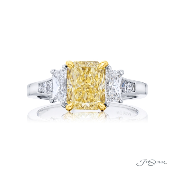 2.01ct. GIA certified radiant cut diamond center embraced between trapezoid diamonds. 2253-001