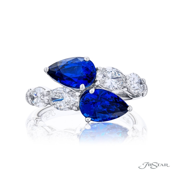 Sapphire and diamond ring featuring 2 CDC certified pear shaped sapphires with cascading oval and pear-shaped diamonds.7384-011