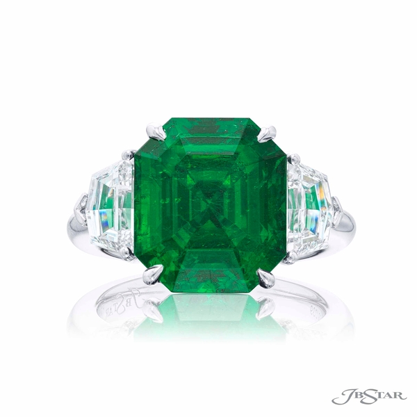 Emerald and diamond ring featuring a 5.74 ct. certified Colombian octagonal-cut emerald embraced by epaulet diamonds.0283-039