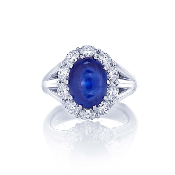 7.38 no-heat oval cabochon sapphire and diamond ring.jpg