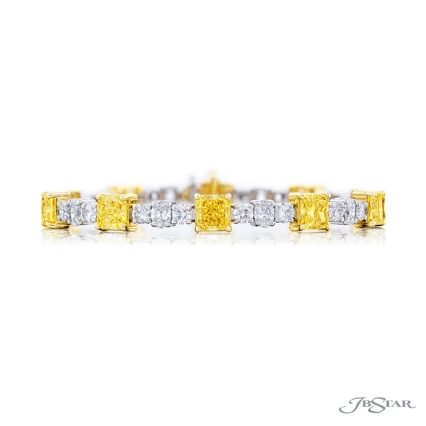 Fancy yellow diamond bracelet featuring 10 GIA certified radiant-cut fancy yellow diamonds linked together by oval and round diamonds 3613-002