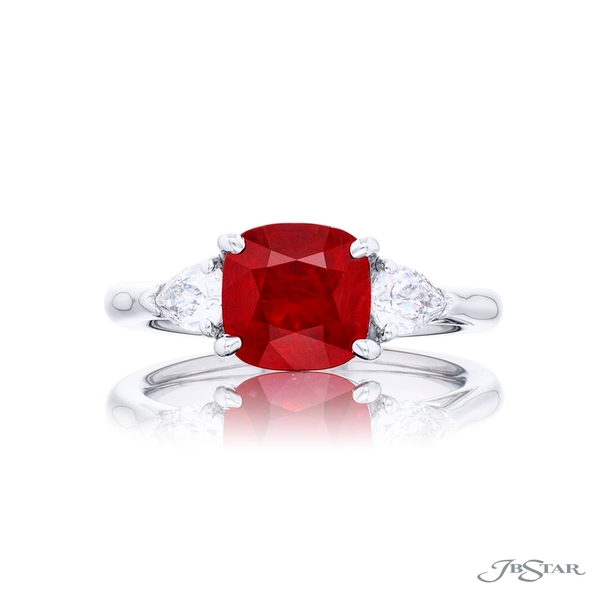 Ruby and diamond ring featuring a 2.18 ct. certified cushion-cut Burma ruby center embraced by 2 pear shaped diamonds.7285-032