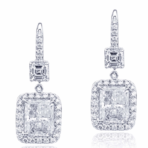 GIA certified radiant-cut diamonds edged in micro pave and hung by square emerald-cut diamonds.jpg